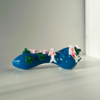 four inch blue spoon pipe with intricate designs of 3d pink flowers, koi fish and leaves bliss shop chicago