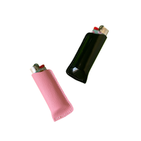 Genuine leather 3 inch Bic lighter sleeve in pink or black patent leather bliss shop chicago