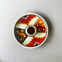 4 inch ceramic dish for palo santo sticks with peruvian geometric design in red orange brown and ivory bliss shop chicago