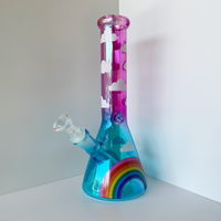 10 inch beaker bong with hot pink and blue ombre color way and rainbow and cloud decals bliss shop chicago