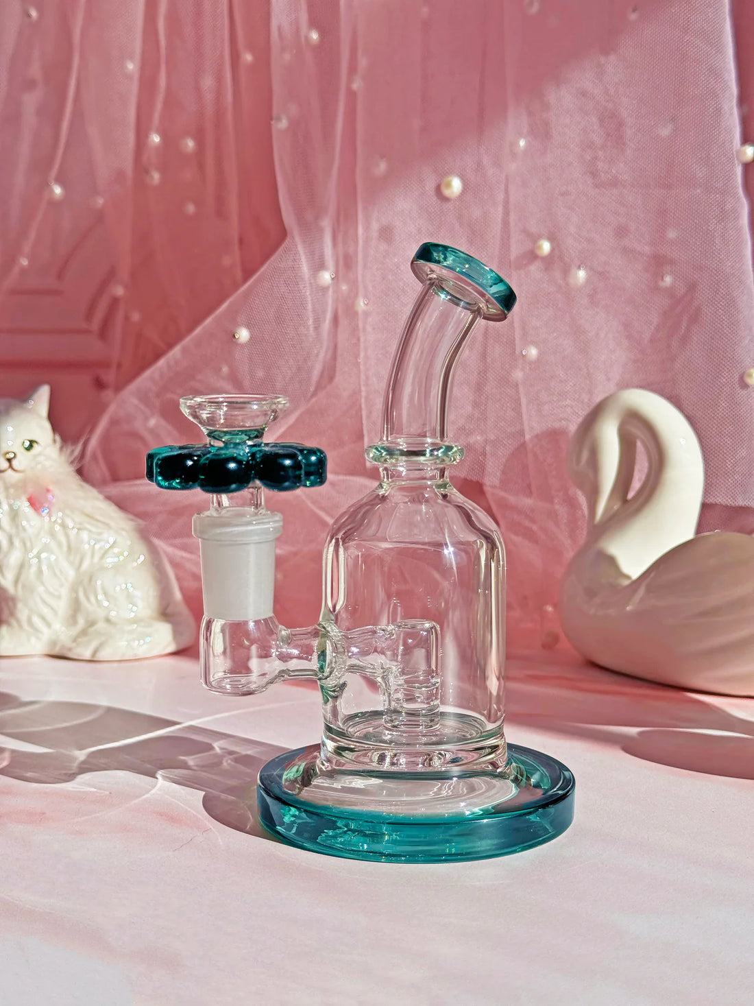 5 inch teal bong or rig with teal flower shaped slide bliss shop chicago