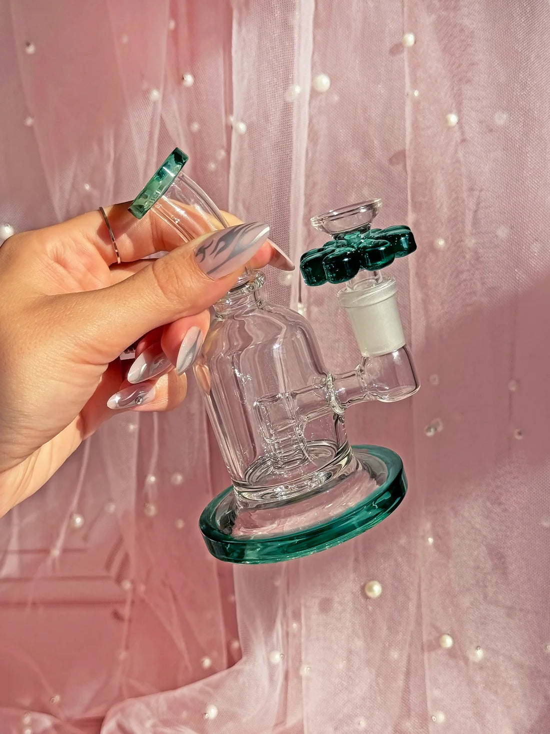 5 inch teal bong or rig with teal flower shaped slide bliss shop chicago