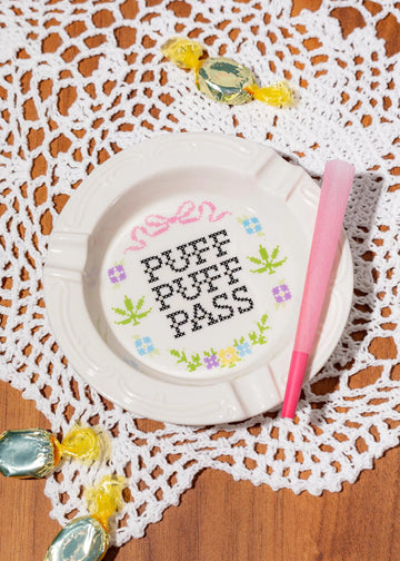 canna style 5 inch white ceramic ashtray with granny cross stitch style design bliss shop chicago