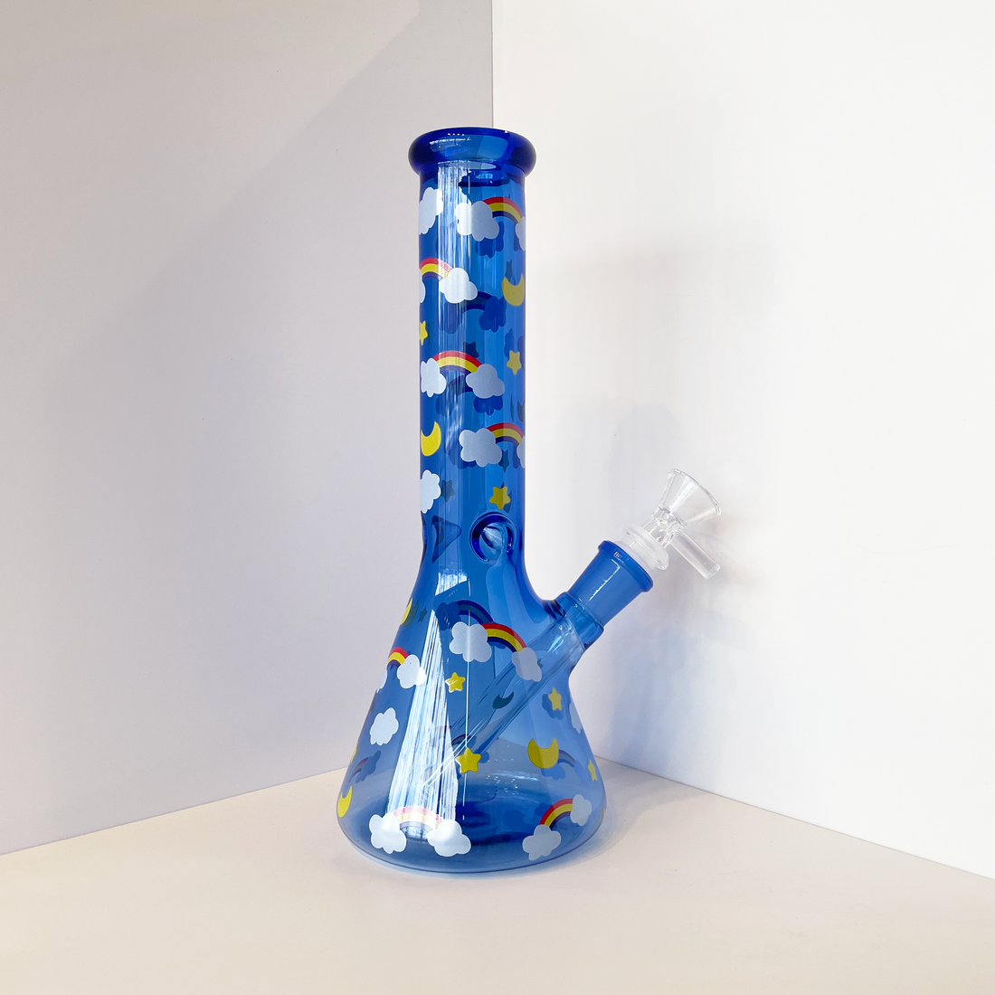 10 inch blue glass beaker bong with moon star rainbow cloud decals all over bliss shop chicago