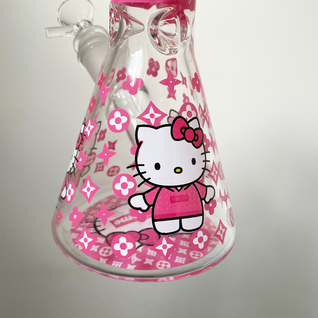 10 inch beaker bong with hot pink decal design of louis vuitton pattern supreme and hello kitty bliss shop chicago