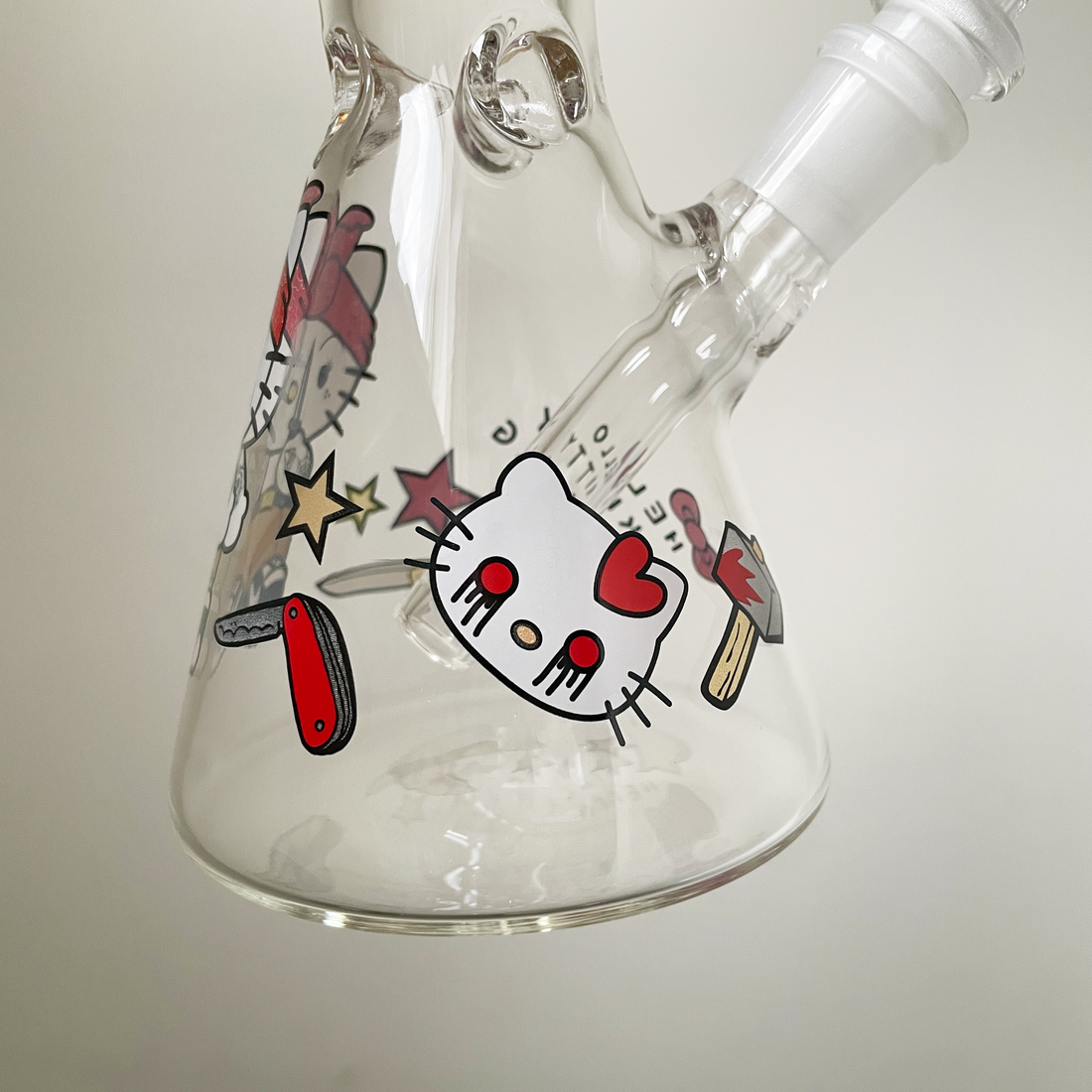 10 inch beaker bong with hello kitty dressed like thug holding knife decal design bliss shop chicago
