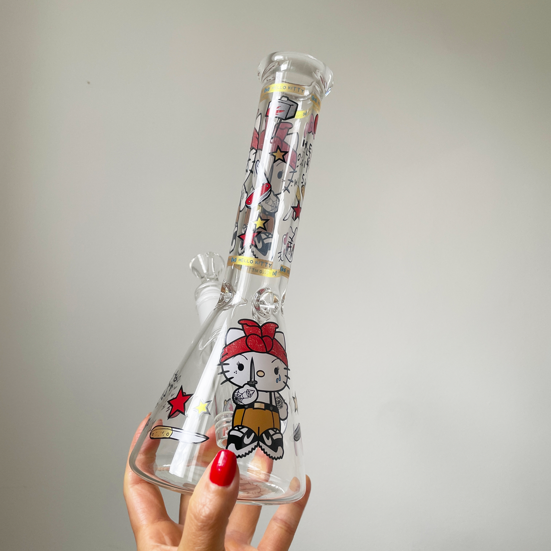 10 inch beaker bong with hello kitty dressed like thug holding knife decal design bliss shop chicago