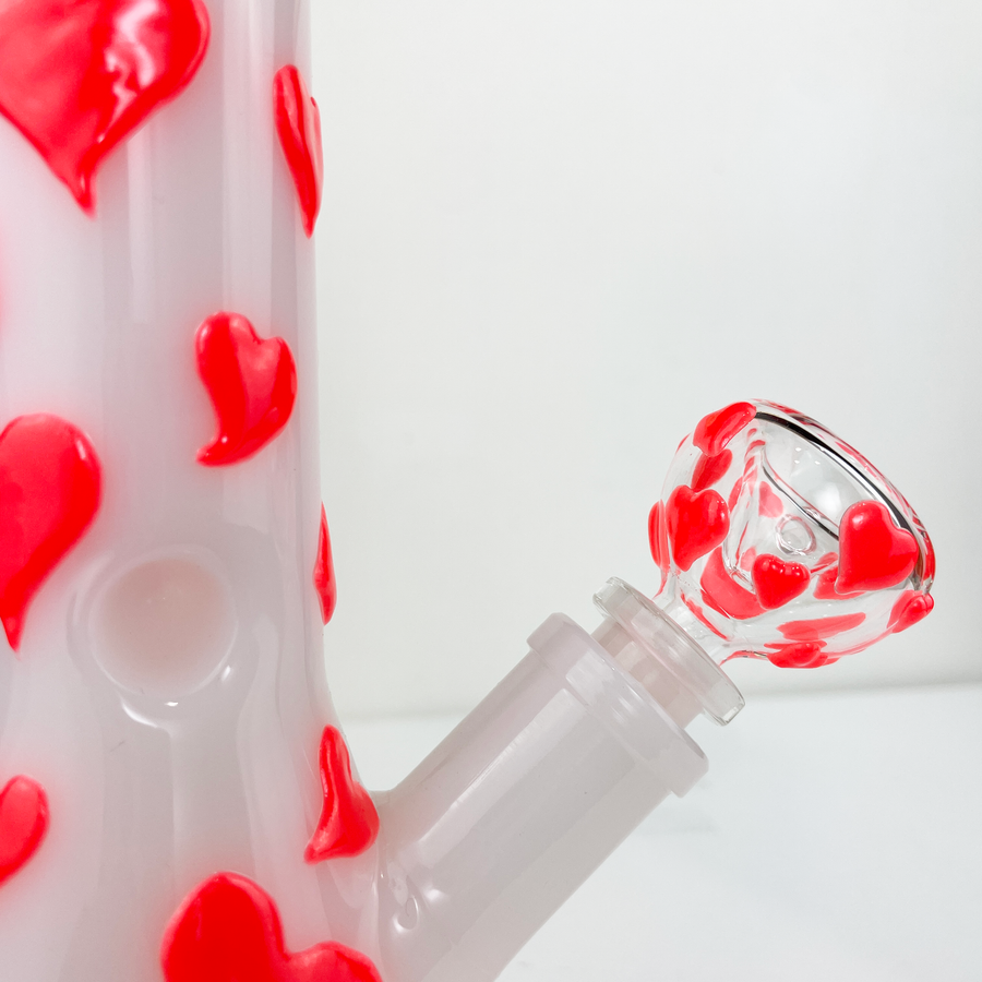 red and white glow in the dark heart beaker bong bliss shop chicago