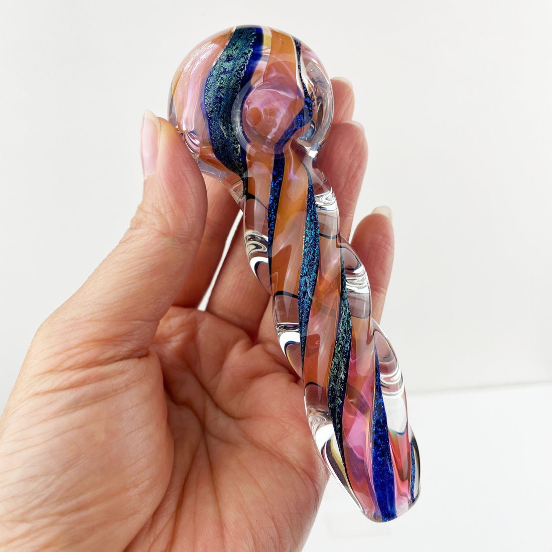 humboldt glass studio 4 inch borosilicate orange spoon pipe with twist design and blue swirls with 24k gold dichro bliss shop chicago