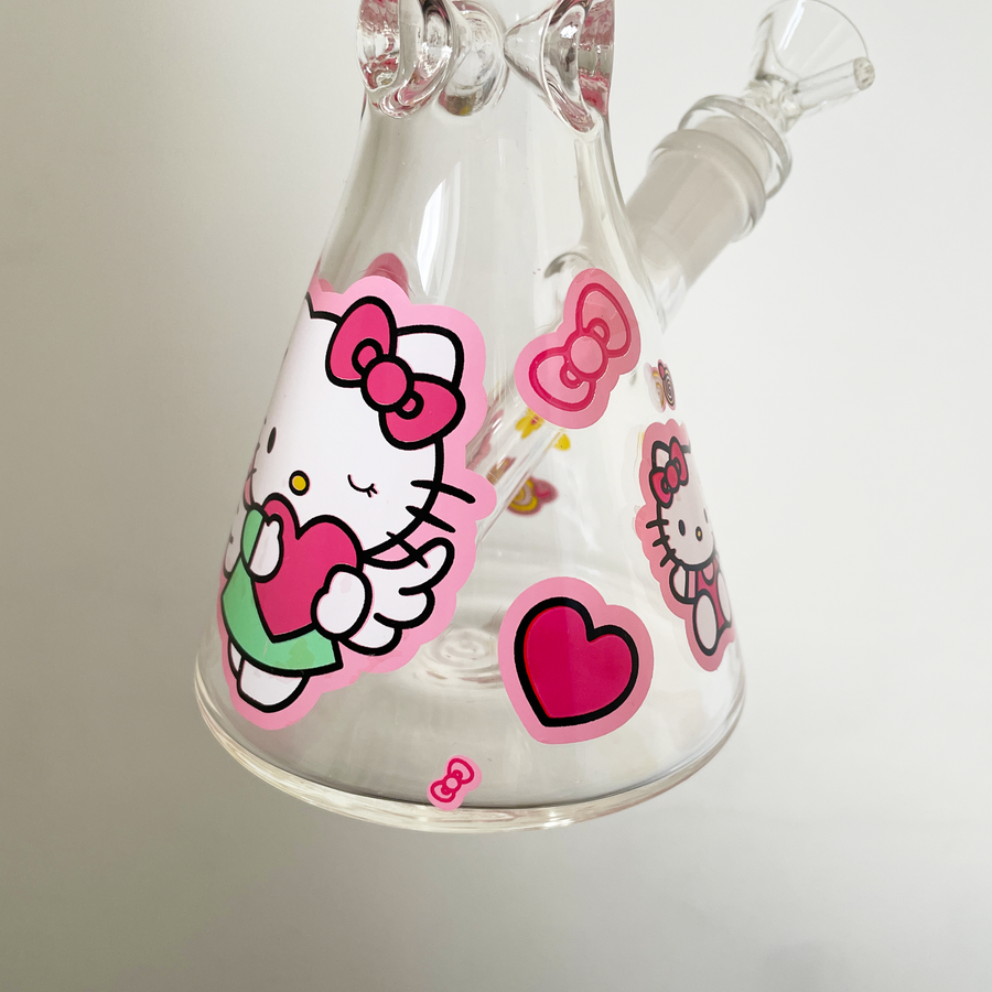 10 inch beaker bong with girly decals of hello kitty and red hearts and pink bows and flowers bliss shop chicago