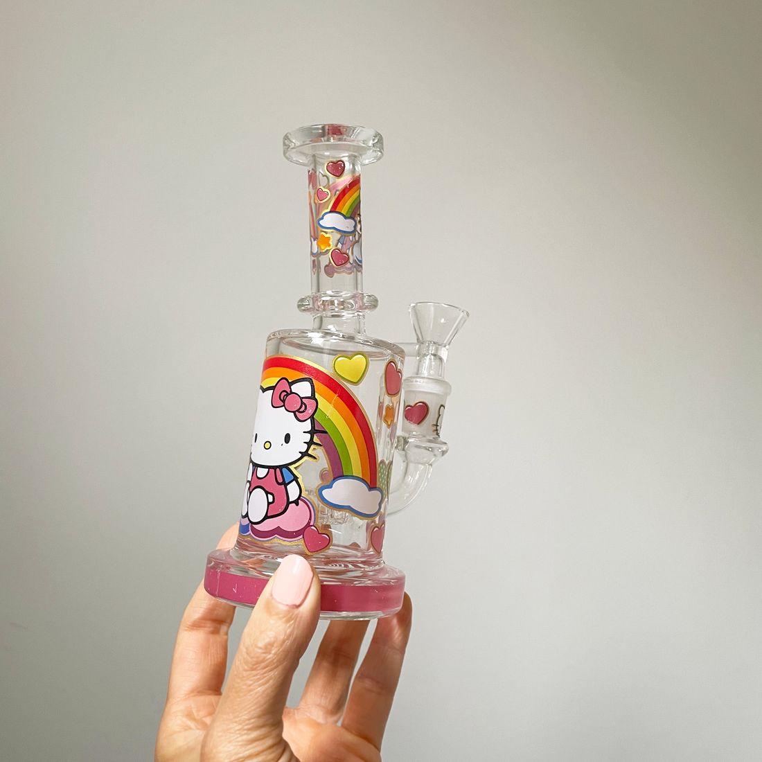 6.25 inch bong or rig with colorful hello kitty heart rainbow and star decals bliss shop chicago