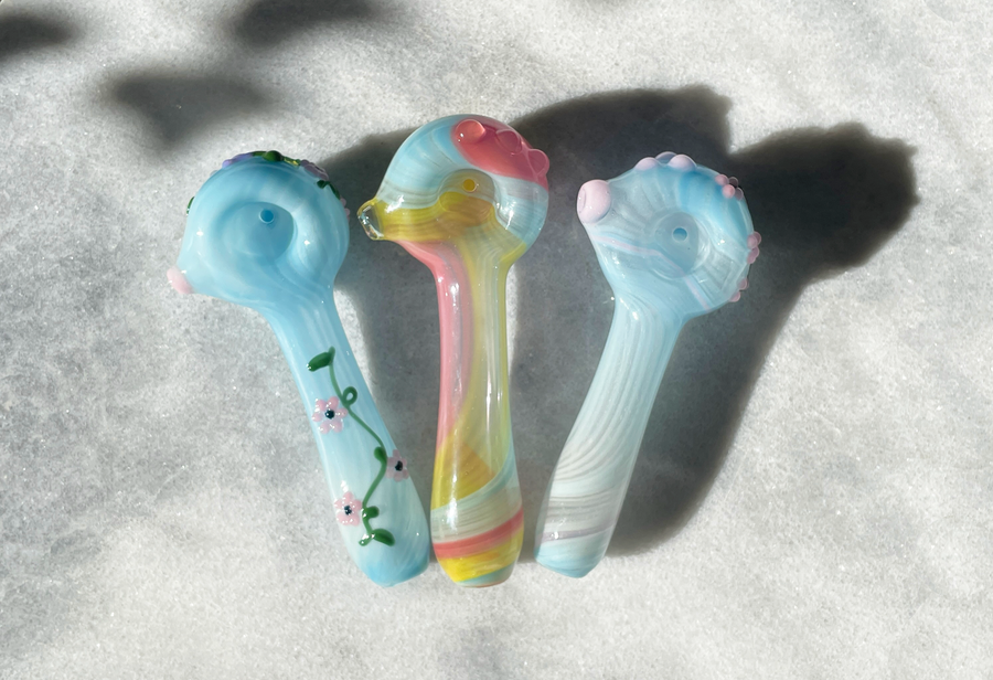 kristi conant blue glass spoon pipe with flower and hummingbird detail bliss shop chicago