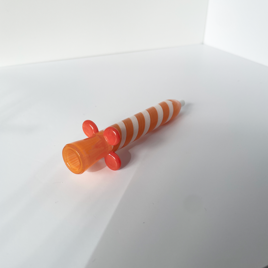 4.25 inch birthday candle design glass chillum with orange and white swirl and orange flared base bliss shop chicago