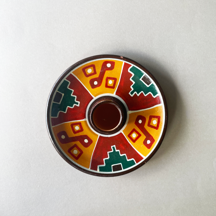 4 inch ceramic dish for palo santo sticks with peruvian geometric design in red orange and green bliss shop chicago