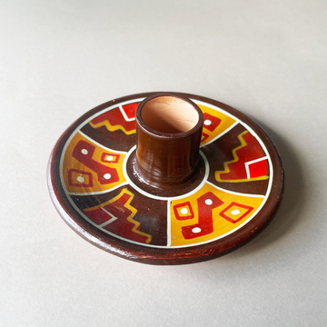 4 inch ceramic dish for palo santo sticks with peruvian geometric design in red orange  and brown bliss shop chicago