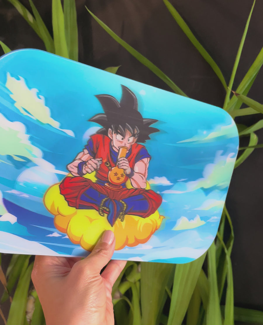 10 by 7 inch metal rolling tray with magnetic lid of hologram image of dragon ball z goku on a cloud smoking a bong bliss shop chicago