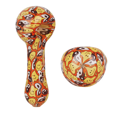 5 inch pulsar spoon hand pipe with orange background and melting yin and yang and yellow happy face bliss shop chicago