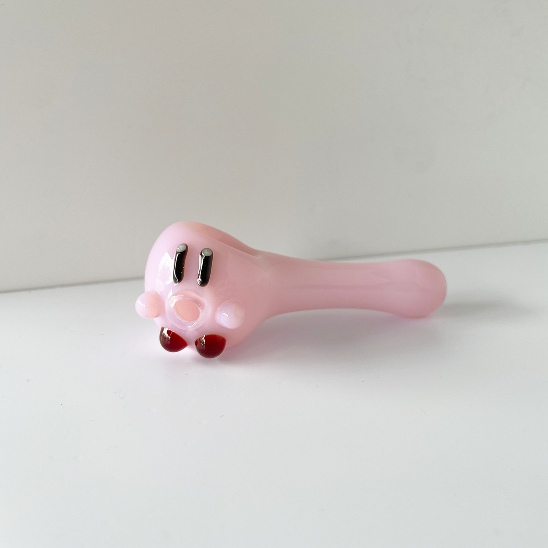 sugarmattys 3 inch pink spoon pipe with kirby face on side of bowl bliss shop chicago