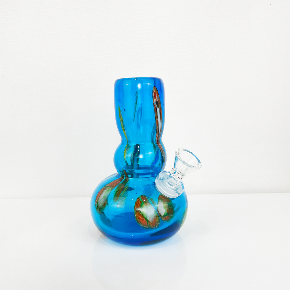 six inch blue soft glass bong with patches of color bliss shop chicago