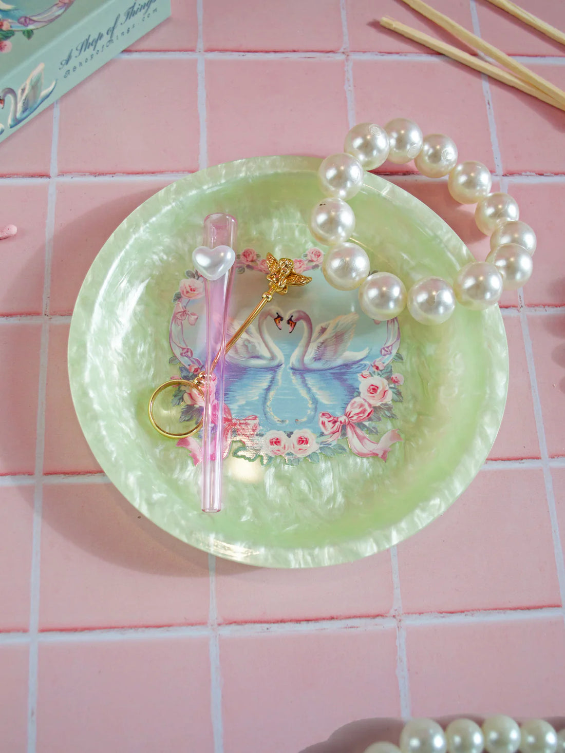 5.5" round acrylic mint green girly rolling tray or trinket dish with 2 swans and pink floral heart wreath design bliss shop chicago