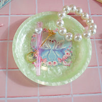 5.5" round acrylic mint green girly rolling tray or trinket dish with 2 swans and pink floral heart wreath design bliss shop chicago